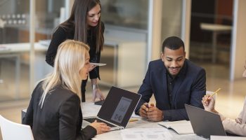 Young people work in modern office